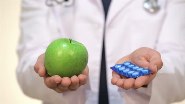 Pharmaceutical and an apple - Filmmaterial, Video