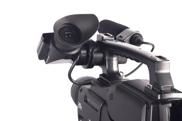 Câmera de vídeo profissional em um fundo branco
 - Foto, Imagem