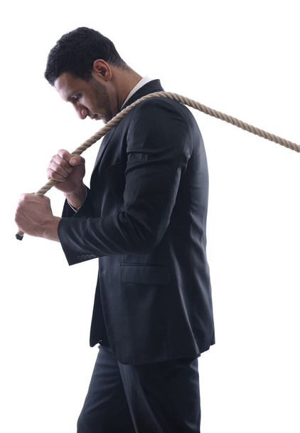 ο άνθρωπος των επιχειρήσεων με σχοινί που απομονώνονται σε λευκό φόντο - Φωτογραφία, εικόνα