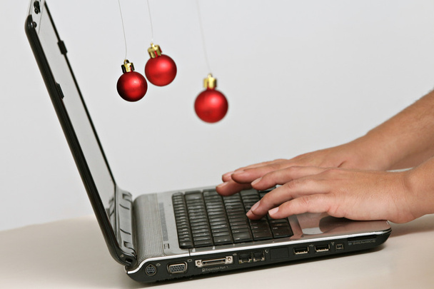woman writing on a laptop keyboard - Photo, Image