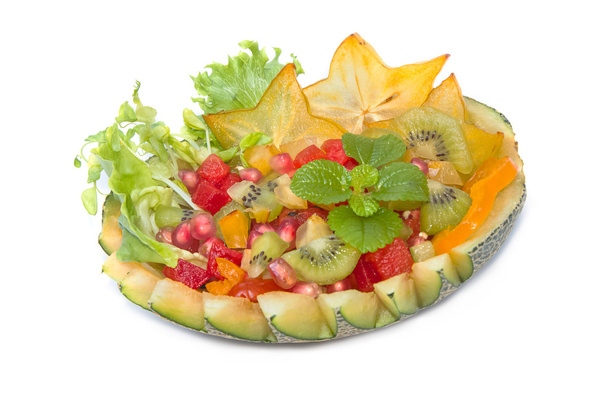 Colorful natural fruit salad  in cantaloupe melon - Photo, Image