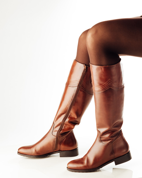 woman legs wearing brown leather high boots - Photo, Image