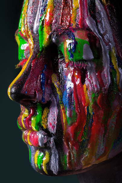 Girl with colored face painted. Art beauty image. - Fotoğraf, Görsel
