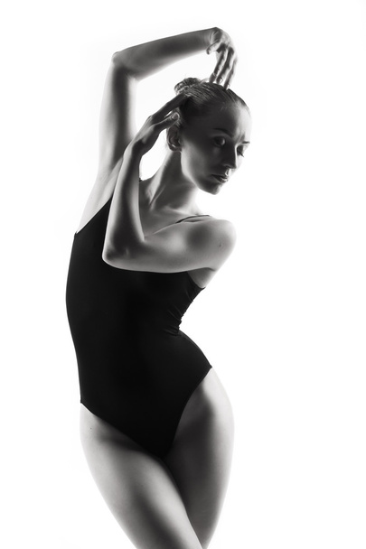 Modern ballet dancer posing on white background - Fotoğraf, Görsel