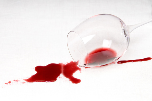 Spilling red wine - 写真・画像
