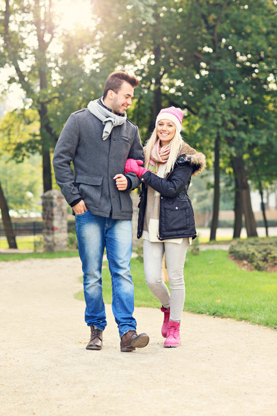 Young couple walking in the park - Photo, Image