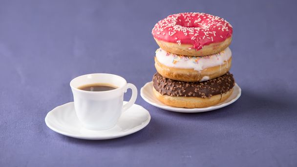 Cup of coffee with donuts - Valokuva, kuva