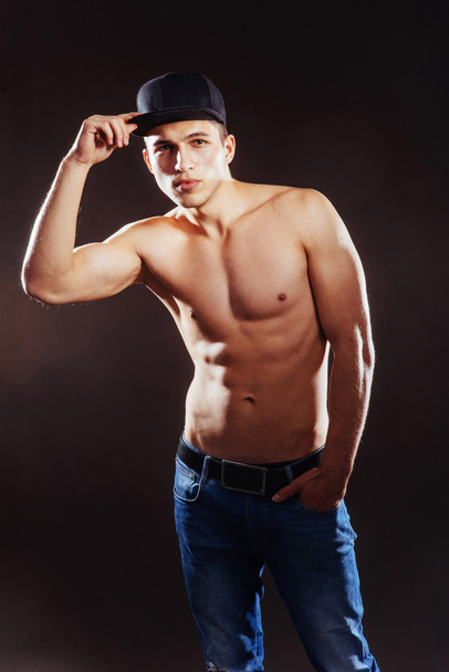 Portrait of a fitness man with nude torso.  - Фото, изображение