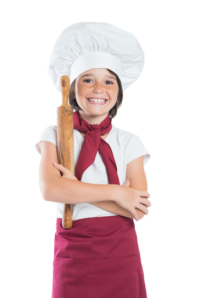 Little chef holding rolling pin - Foto, afbeelding