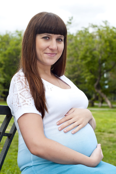 Pregnant Young Woman smile - 写真・画像