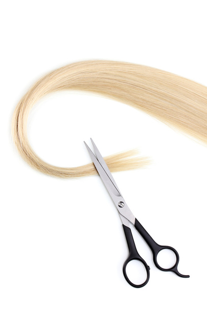 Shiny blond hair and hair cutting shears isolated on white - Фото, зображення