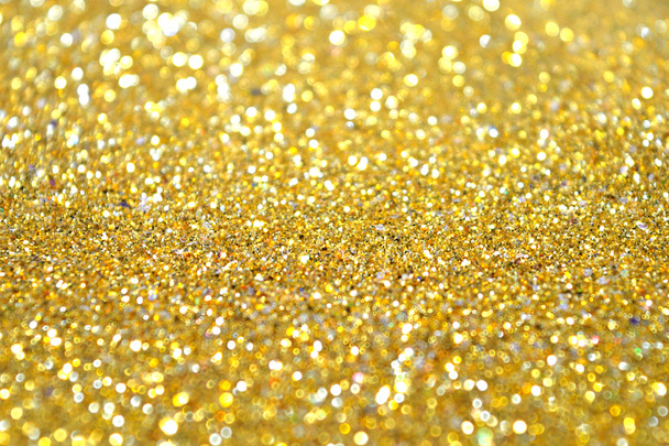 Wazig vakantie achtergrond met gouden glitter schittert met plaats voor uw tekst - Foto, afbeelding