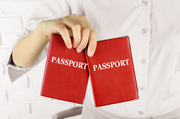 Female hand holding passports - Фото, зображення