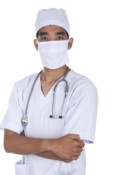 Thoughtful doctor wearing mask - 写真・画像