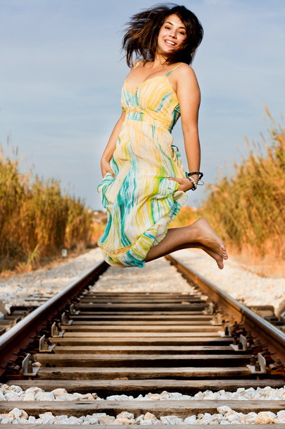Beautiful girl on a railway - Foto, Bild