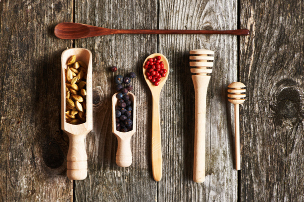 Spices in wooden spoons - Foto, imagen
