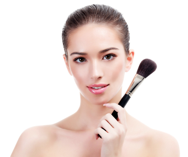Pretty woman with makeup brush - Photo, Image