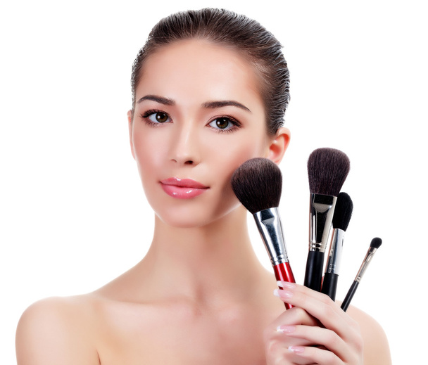 Pretty woman with makeup brushes - Foto, Imagem