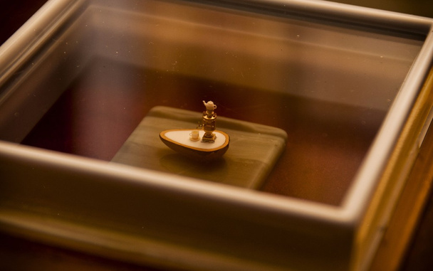 A miniature samovar on the seed. - Foto, Bild