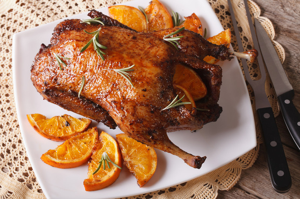whole baked duck with oranges and rosemary close up. horizontal - Photo, Image