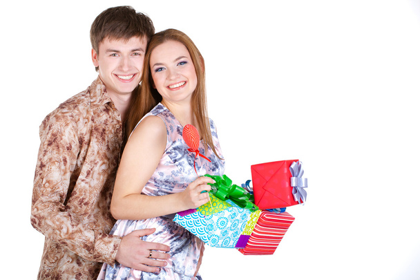 Young couple with gifts - Foto, afbeelding