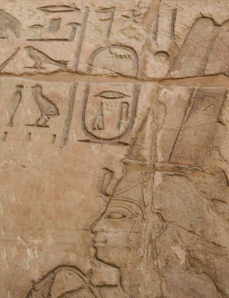 Egyptian hieroglyphic carvings on wall - Photo, Image