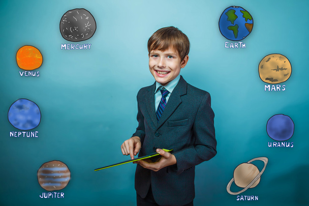 youth teenager boy laughing businessman holds hand tablet planet - Zdjęcie, obraz