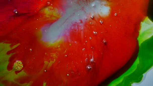 Зелений і червоний кольоровий рідкий абстрактний фон
 - Кадри, відео