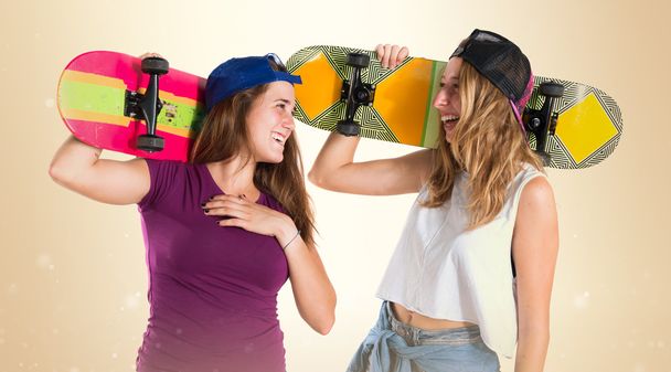 Two friends with their skateboards - 写真・画像