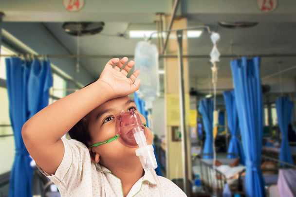 boy sick in inhaler mask for kid in patient room background - Photo, Image