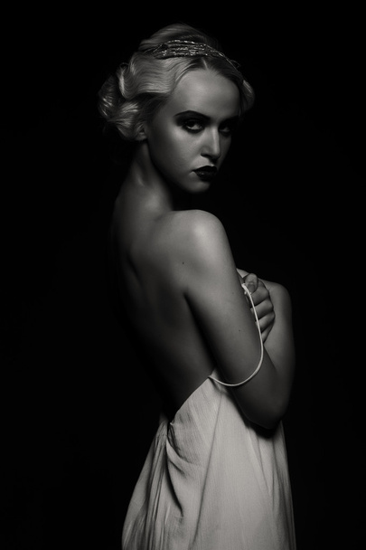 Beautiful blonde in vintage dress on a dark background - Фото, зображення