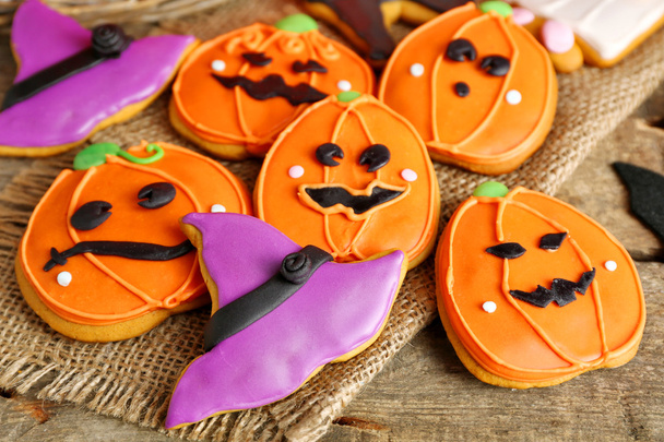 Creative cookies for Halloween party on wooden table, close up - Φωτογραφία, εικόνα