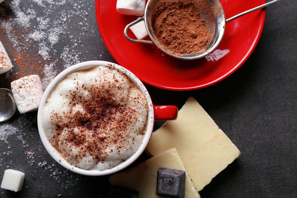 Cup of coffee and sweets on black wooden background - Foto, Imagem