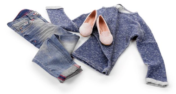 Blue jeans and pullover with shiny pink shoes isolated on white background - Photo, Image