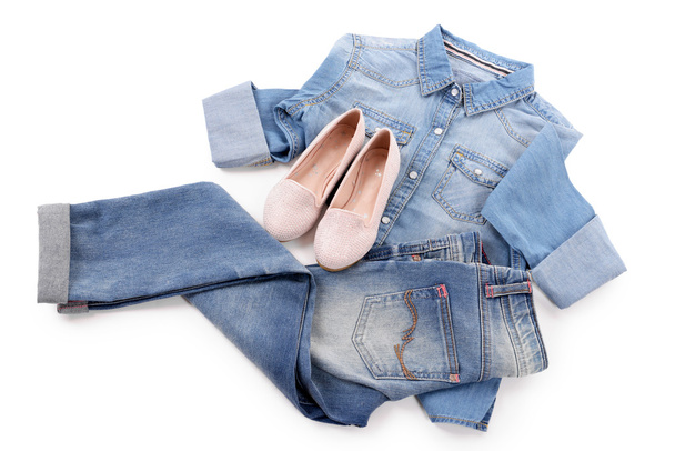 Blue denim shirt and jeans with pink shoes isolated on white background - Fotó, kép