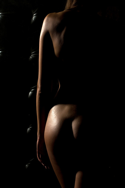 Undressed young woman - 写真・画像