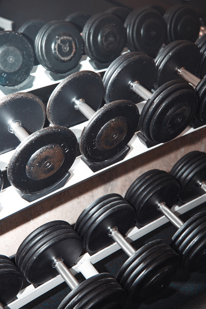 Barbells in the gym. Close-up photo - Fotografie, Obrázek