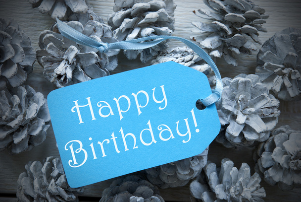Light Blue Label On Fir Cones With Happy Birthday - Foto, immagini