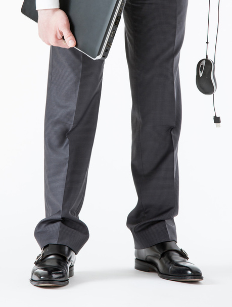 бизнесмен с ноутбуком и компьютерной мышью
 - Фото, изображение