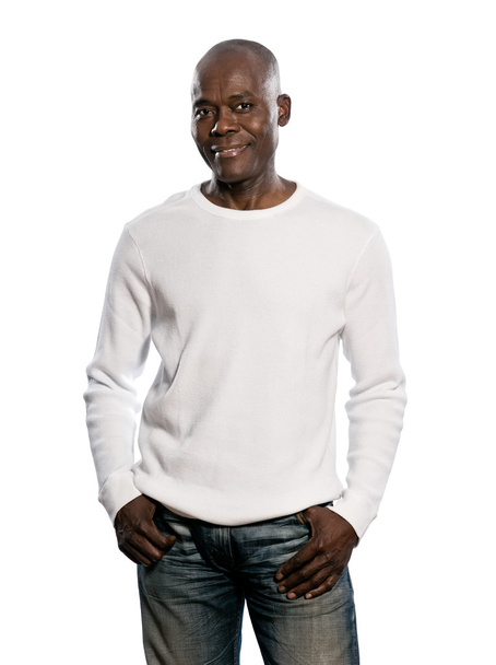Casual afro American man standing with hands in pocket - Фото, изображение