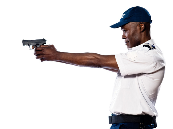 Male policeman officer shooting aiming gun - Photo, image