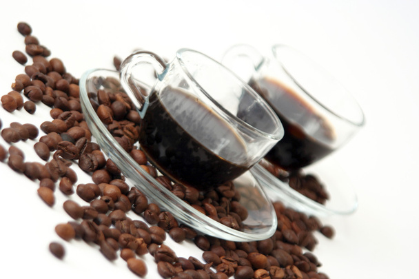 tazas de café con granos de café
 - Foto, imagen