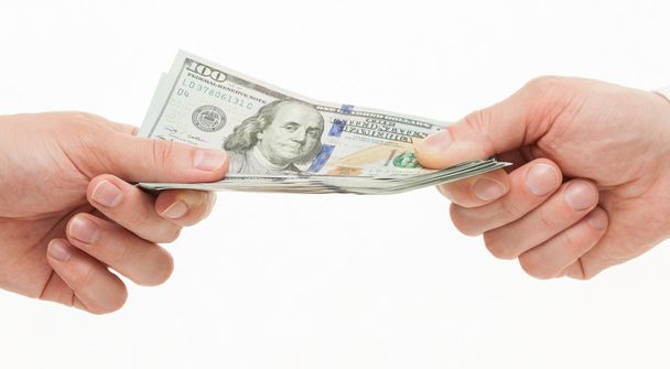 Businesspeople's hands holding dollars - Foto, immagini