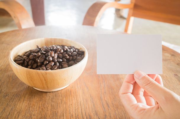 Смажені кавові зерна та візитка
 - Фото, зображення