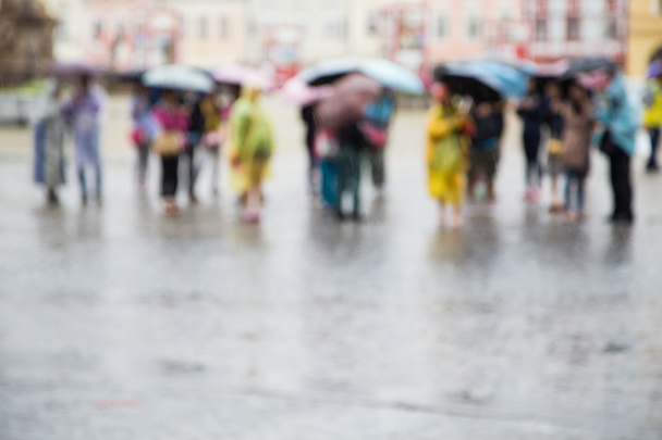 People with umbrellas - Foto, Imagen