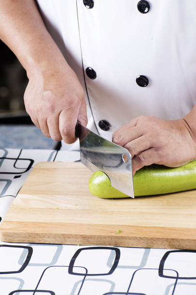 Chef slicing green eggplant  - Photo, Image