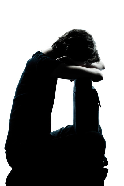 One young teenager girl crying sad silhouette - Fotó, kép