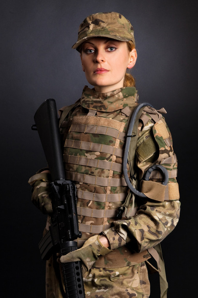 Beautiful army girl with rifle - Foto, Imagem