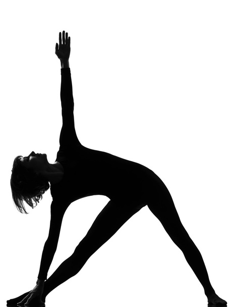 Parivritta trikonasana woman yoga triangle pose - Photo, image