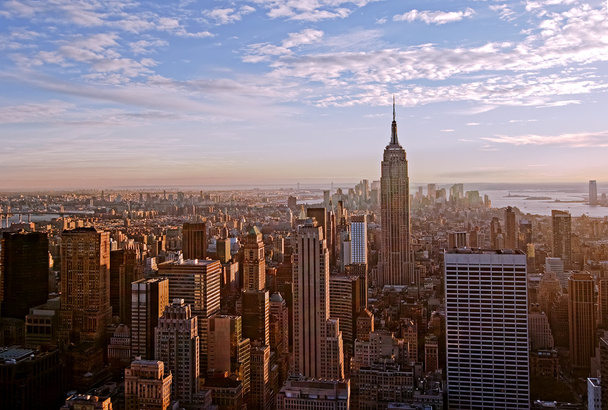Puesta de sol sobre Manhattan
 - Foto, imagen